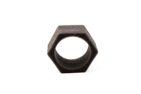Piece of foam rubber on white background. Black sponge Stock Photos