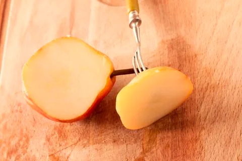 Piece of fresh pear Stock Photos