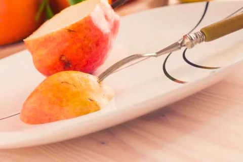 Piece of fresh pear Stock Photos