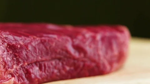 Piece of fresh raw beef, closeup Stock Footage 73769234