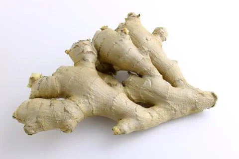 A piece of ginger root top view. Stock Photos