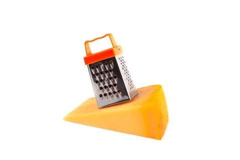 Piece of huge cheese and tiny metal grate isolated on white Stock Photos