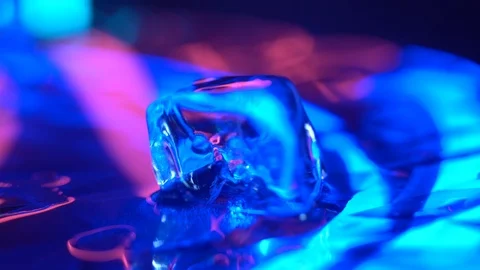 Piece of ice rotating in water Stock Footage 106828417