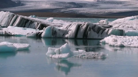 A piece of ice slowly floats down the river in the ocean. Andreev. Stock Footage 78016446
