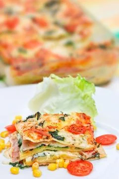 Piece of lasagna on the fork Stock Photos