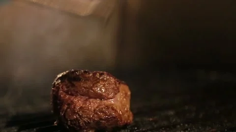 A piece of meat on the grill close up Stock Footage 61157581