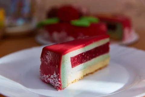 A piece of mousse cake in close-up. Stock Photos