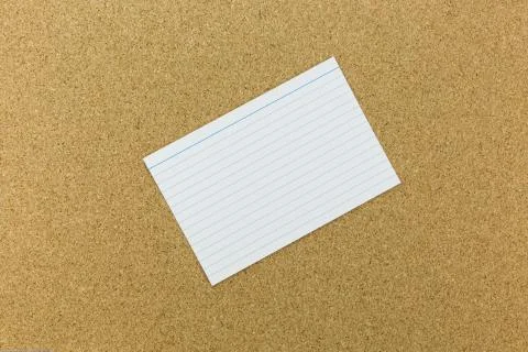 Piece of note on cork board Stock Photos