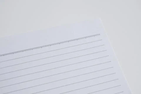 Piece of note paper isolated white background. Stock Photos