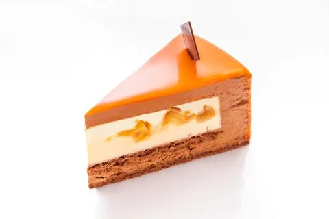 Piece of orange cake Stock Photos