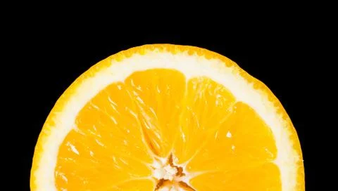 Piece of orange cut in half Stock Photos