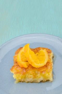 Piece of orange pie Stock Photos