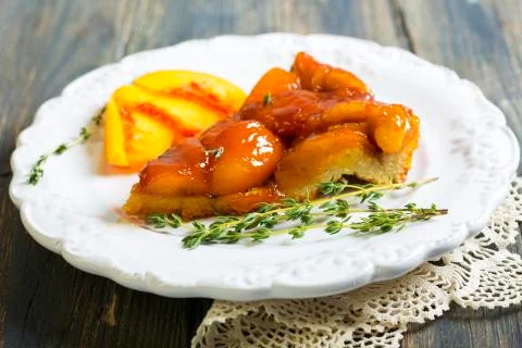 Piece of peach pie closeup. Stock Photos