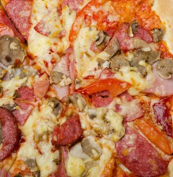 Piece of pizza close-up. Stock Photos