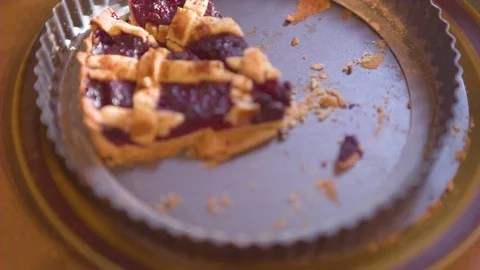 Piece of plum pie in tray Stock Footage 76139437