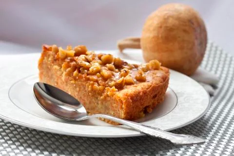Piece of pumpkin pie with walnuts Stock Photos