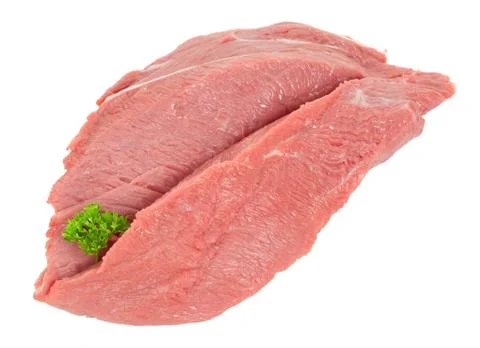 Piece of raw beef with parsley Stock Photos