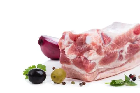 Piece raw meat with decor from on side Stock-Fotos