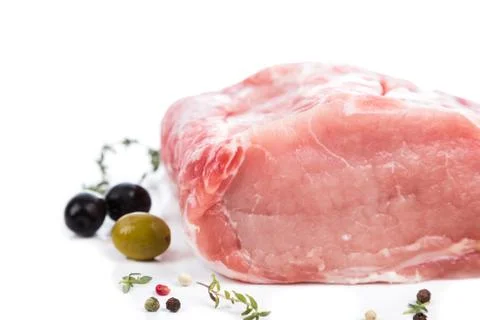 Piece raw meat with decor from on side Stock Photos