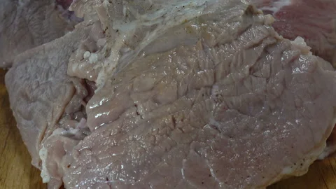 A piece of raw meat Stock Footage 143828608