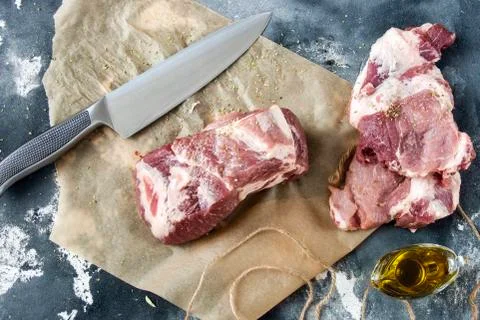 Piece of raw meat on the table Stock Photos