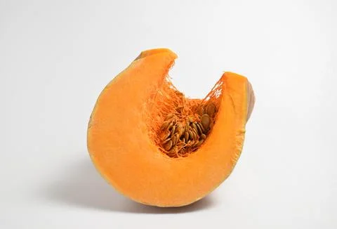 A piece of raw ripe pumpkin Stock Photos