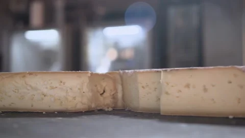 A piece Serra da Canastra Cheese that was cured in a cellar of a Brazilian Farm Stock Footage 258684072