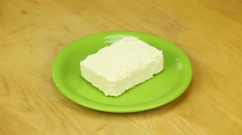 Piece of sheep cheese Stock Footage 45740331