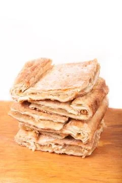 Piece of slice thin sweet pie on wooden Foto stock