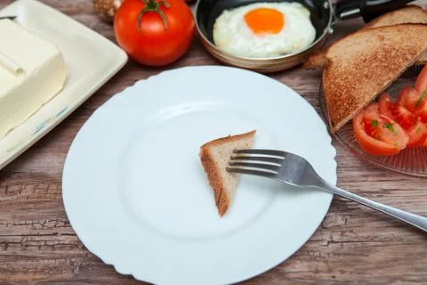 Piece of toast on a fork Stock Photos