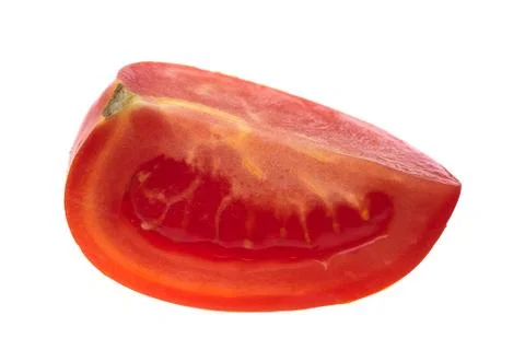 Piece of tomato isolated on white Stock Photos