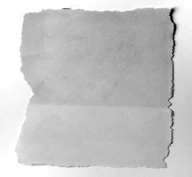 Piece of torn paper on plain background Stock Photos