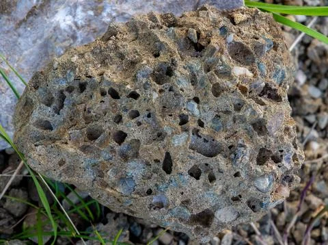A piece of vesicular basalt, a type of volcanic igneous rock Stock Photos