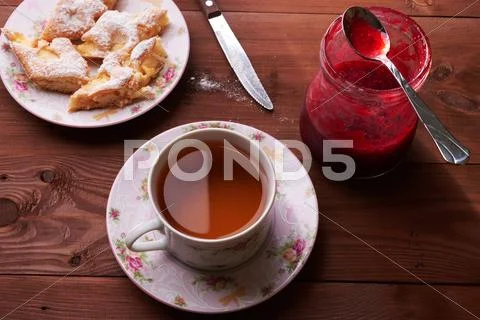 Pieces of apple pie on a plate with tea Stock Photos