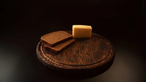 Pieces of bread, cheese, cucumber, jamon, ham are placed on a tray. for cooking Stock Footage 148627461