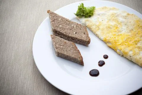 Pieces of bread with omelette 库存照片