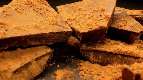 Pieces of broken chocolate close-up Foto stock