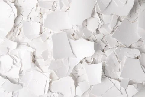 Pieces of broken eggshells as background, top view Foto stock