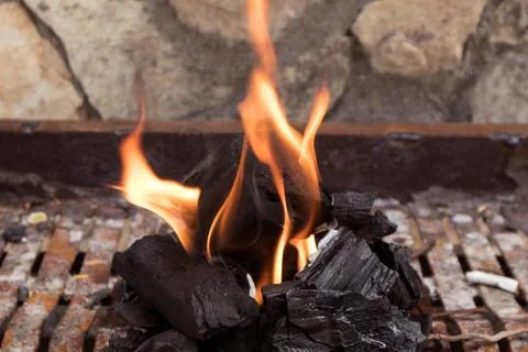 Pieces of burning coal Stock Photos