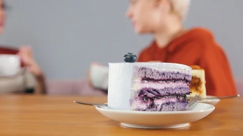 Pieces of cake are standing on the table Stock Footage 118529959