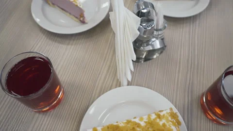 Pieces of cakes on the table, office sweets, different flavors Stock Footage 219471371