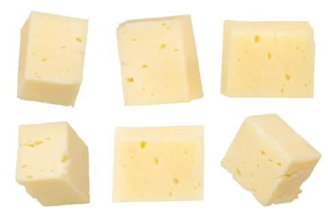 Pieces of cheese isolated on white background. Cheese for pizza. Cheese cut into Stock Photos
