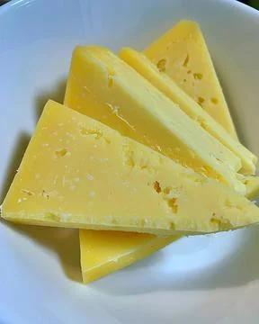 Pieces of cheese Stock Photos