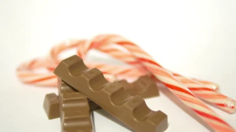 Pieces of Chocolate and Candy Canes 2 4K Stock Footage 45694529