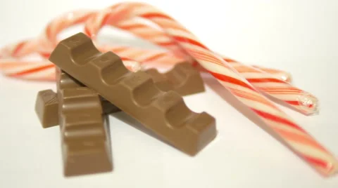 Pieces of Chocolate and Candy Canes 1 4K Stock Footage 45694722