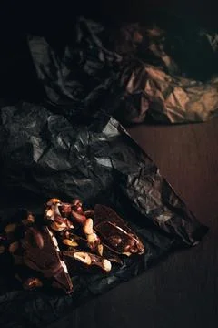 Pieces of chocolate with nuts Stock Photos