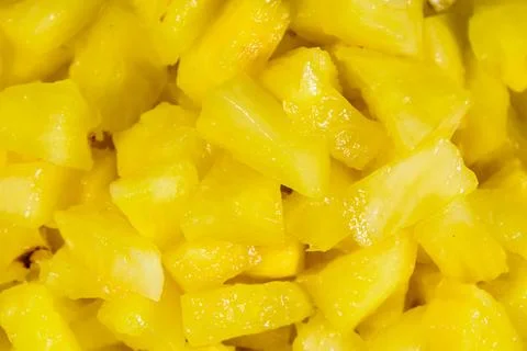 Pieces of chopped pineapple for the background Stock Photos