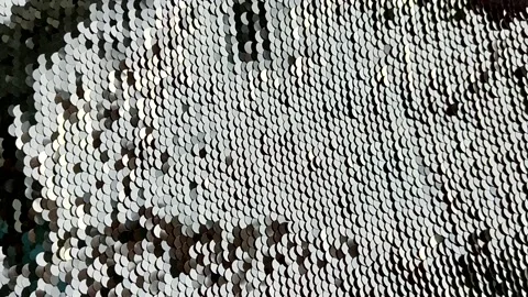 Pieces of cloth with silver sequins. Glitter background. Sequin texture. Stock Footage 161591758