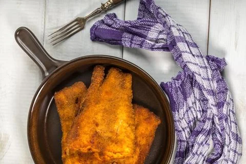 Pieces of cod in breadcrumbs. Stock Photos