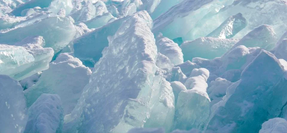 Pieces of cold ice. Background image. Stock Photos